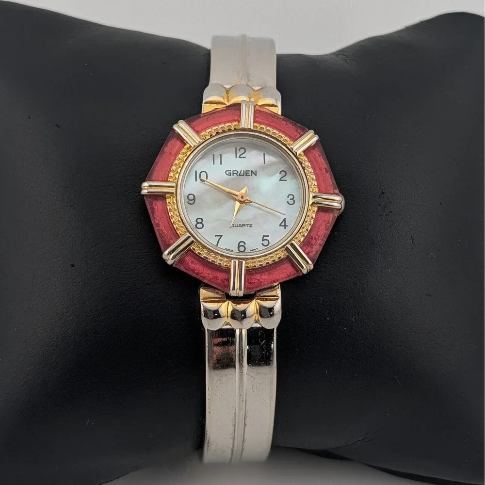 Gruen CR7183 Mother‎ of Pearl Dial Red lucite Bezel Two Tone Bangle Watch